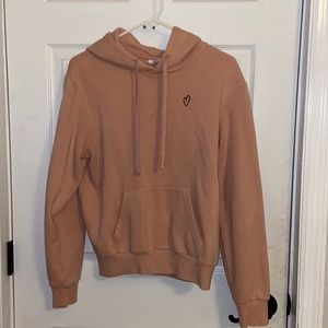 H&M pink sweatshirt with black heart